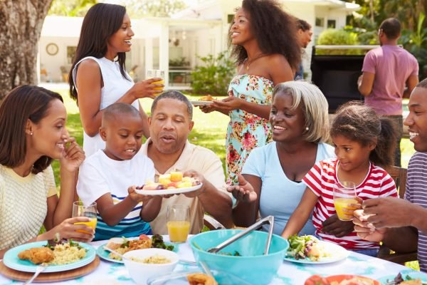 multi generation family enjoying bbq