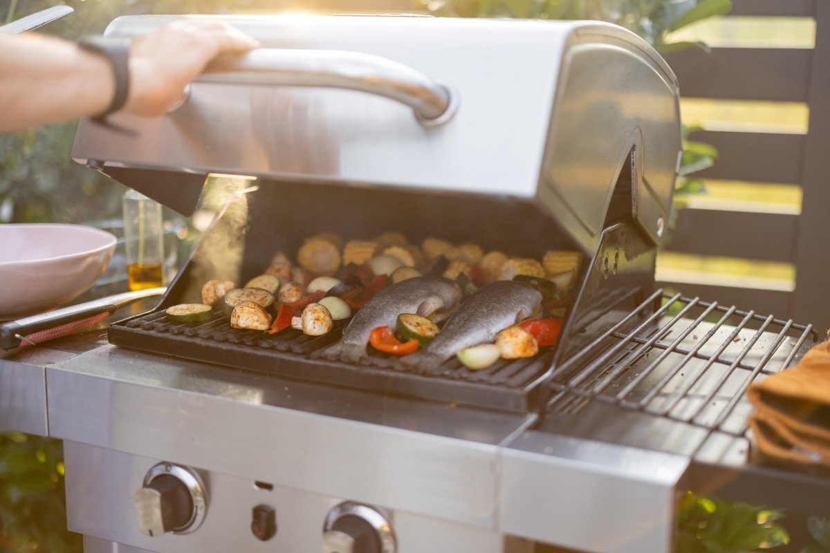 Grilling Fish And Corn On A Grill